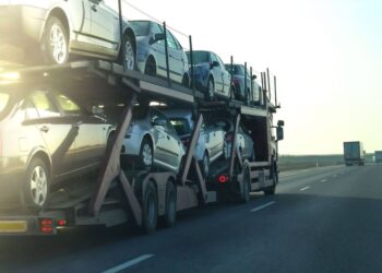 vehicle transporter loaded with cars