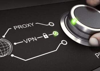 Man using a switch to select a secure VPN connection. Virtual Protection Network and online privacy concept. Composite image between a hand photography and a 3D background.